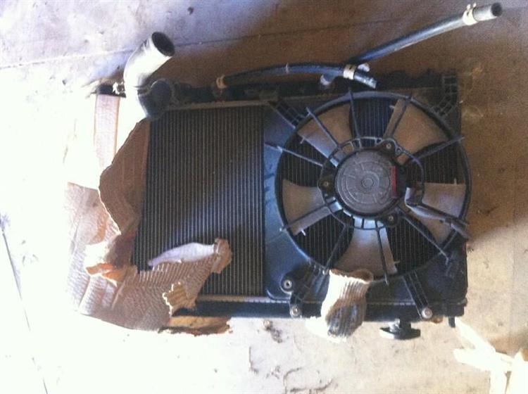 Радиатор основной Хонда Фит в Алдане 1288
